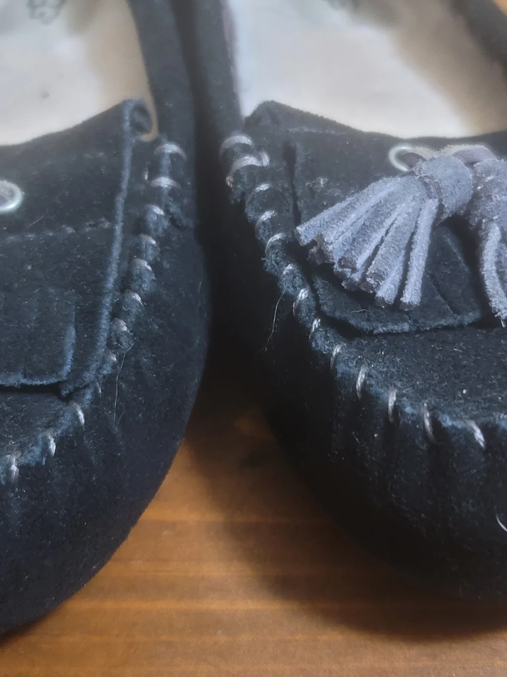 UGG  Black Suede Tassel Moccasin Slippers